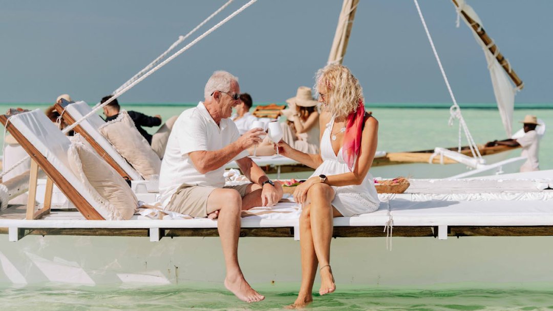 Couple enjoying a peaceful moment together on a boat in the ocean